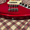 Fender  Jazz Bass Deluxe American 1997 Candy Apple red Transparent