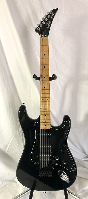 1996 Epiphone by Gibson Stratocaster - Black Sparkle w/ Floyd Rose