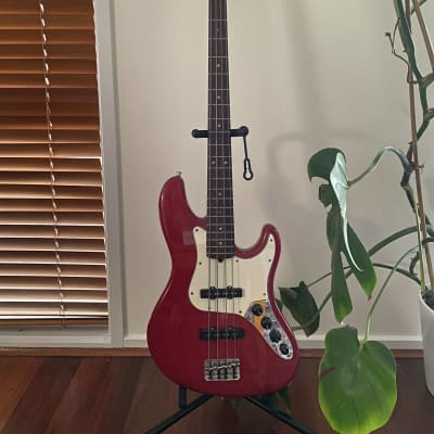 Fender American Deluxe Jazz Bass with Rosewood Fretboard 1999 Crimson Red Transparent for sale