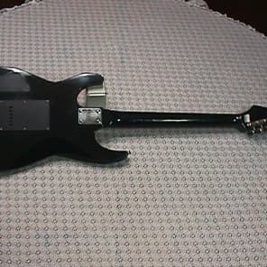 Vintage Rockster Solid Body Electric Guitar with Spiderman? Kick Axx on it's Front as-is image 4