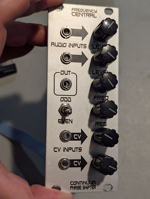 Frequency Central Continuum Phase Shifter