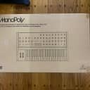 Behringer MonoPoly 37-Key Polyphonic Synthesizer with Cover