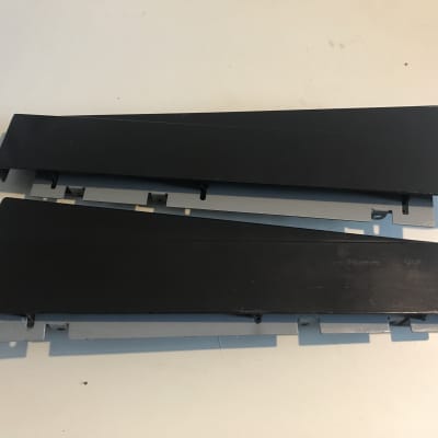 Yamaha DX7 Endcaps. Original. Includes both left and right endcaps and metal inserts. Not cracked but used.