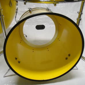 North drum set in yellow with 6'',8''10'' toms a 14'' floor tom and a 22'' bass drum with rack image 4